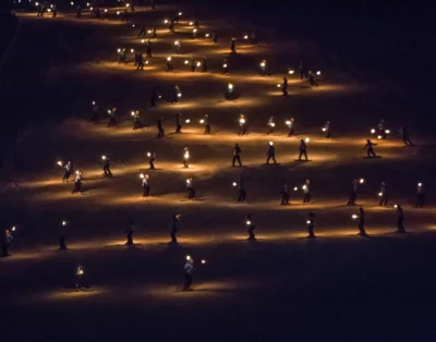 Torchlight procession with ski instructors